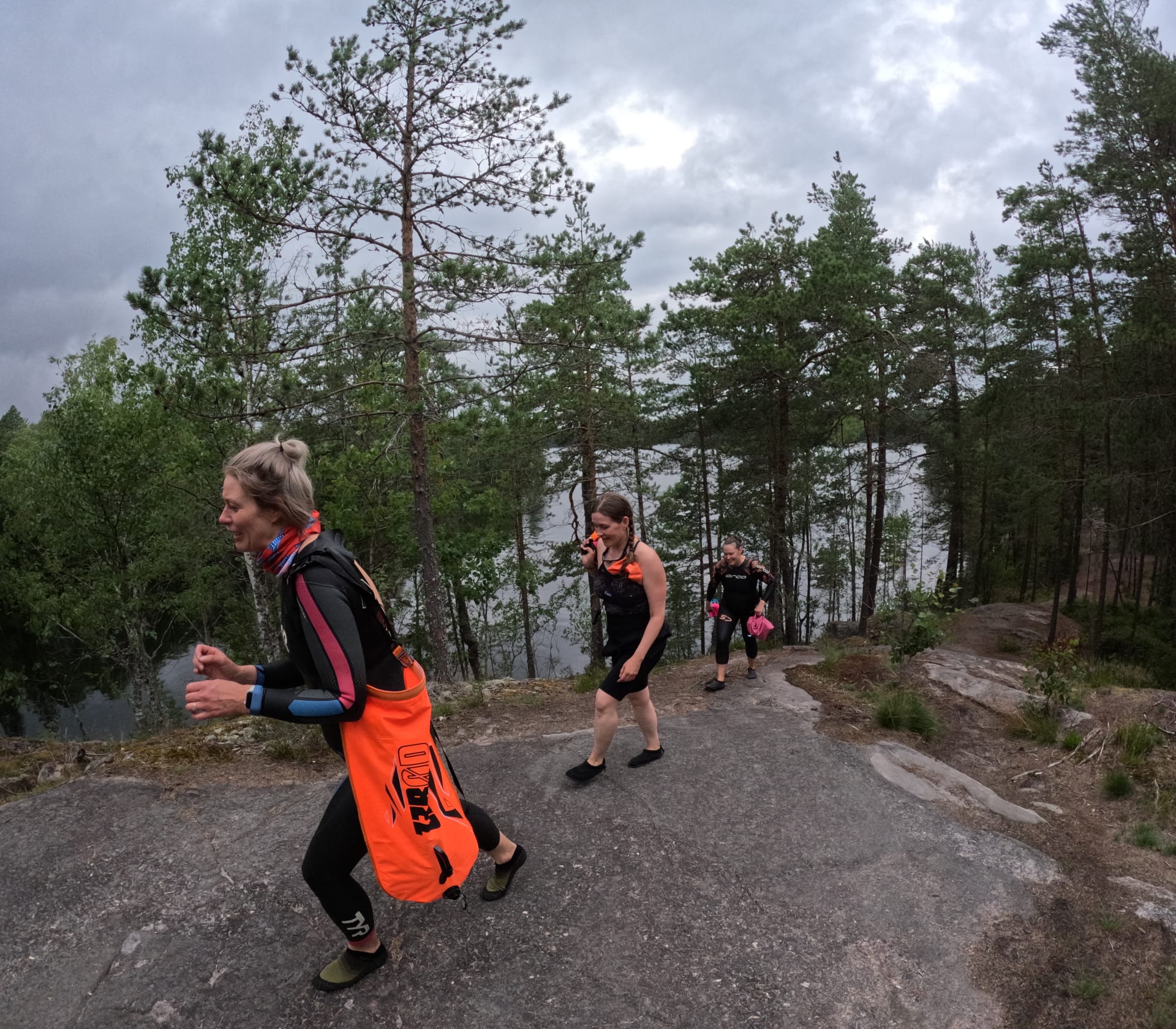 Women are hiking in the rocks