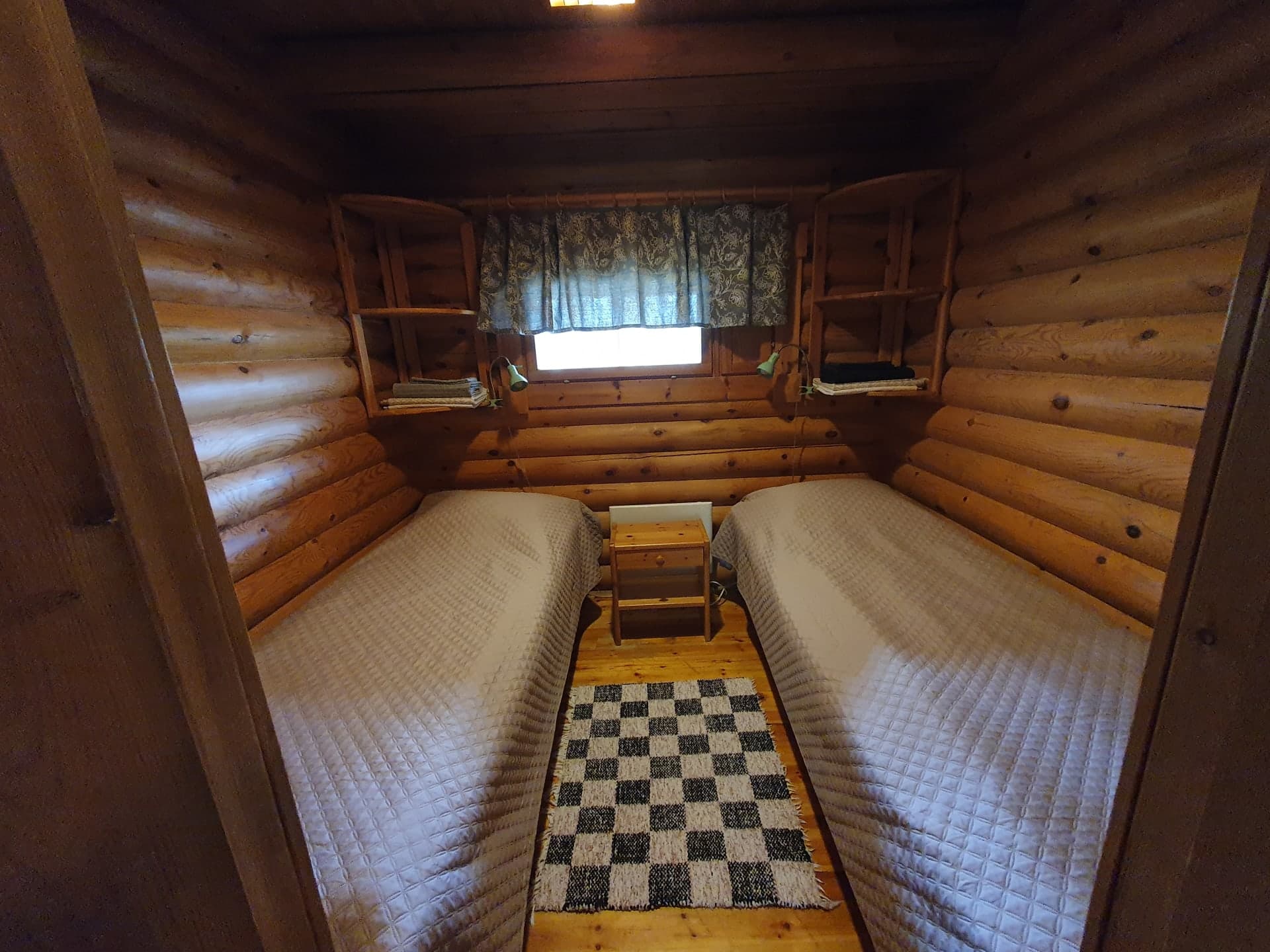 Lampimökki bedroom