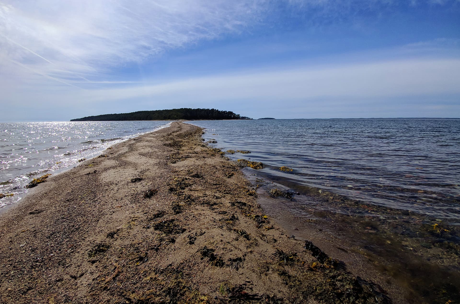 Image: Jani Virtanen Sandy cape by the sea with an island in the background