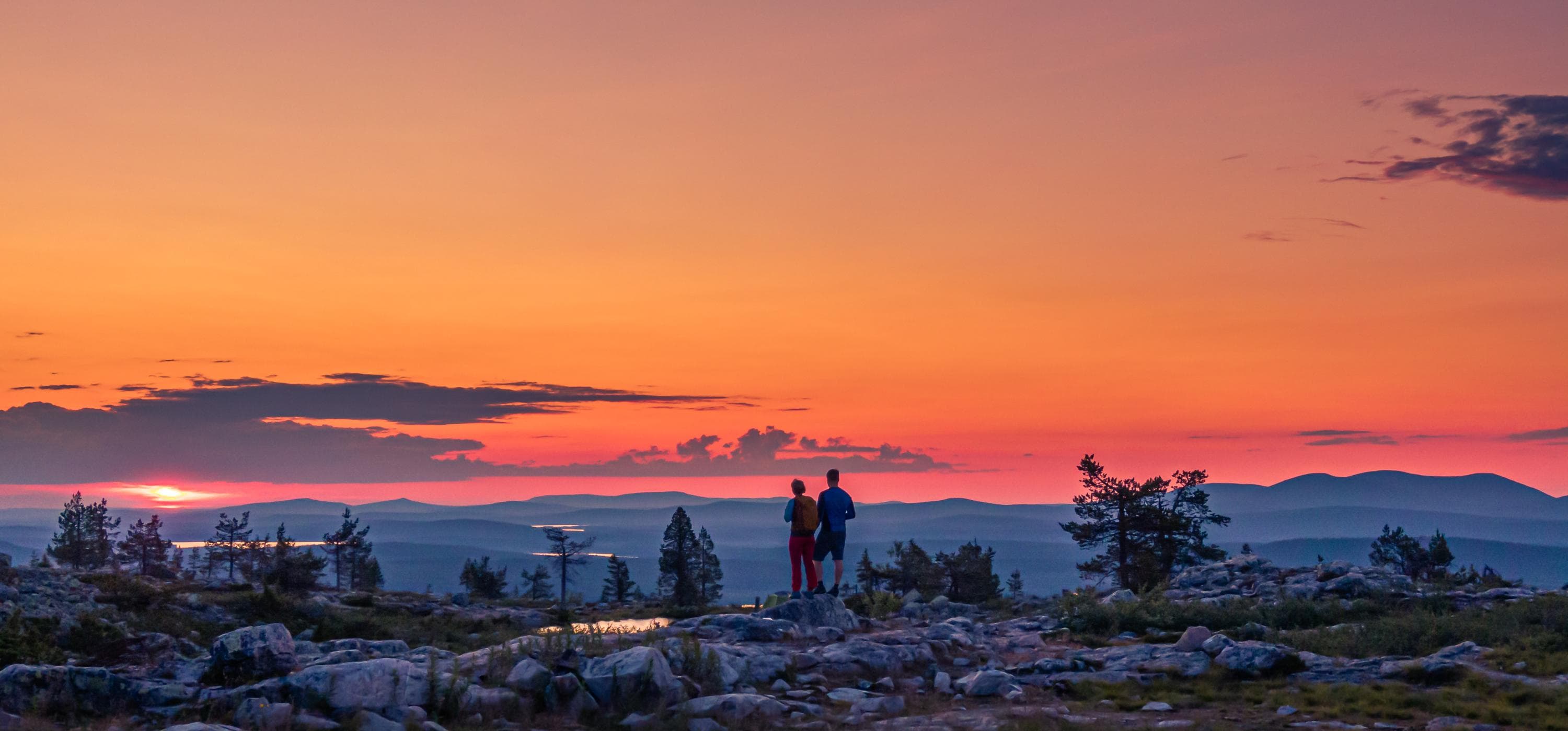 Image: Rami Valonen. Hikers in the fell at sunset.
