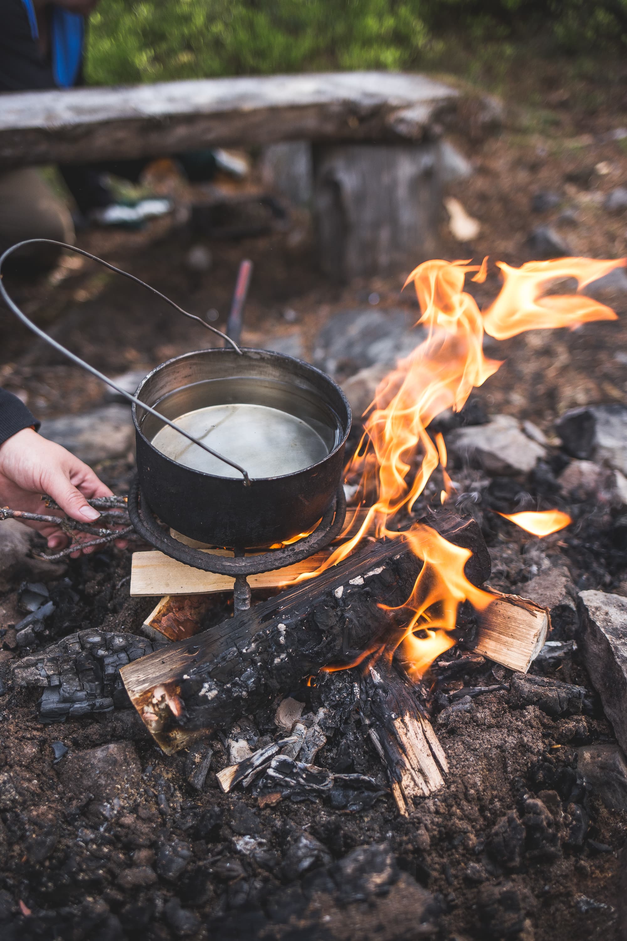 Image: Heikki Sulander Water is being boiled on a campfire.